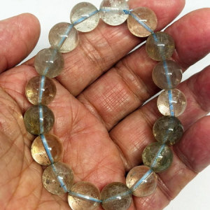 สร้อยข้อมือควอต์ซใส-12 มม. (12 mm. Clear Quartz Bracelace)